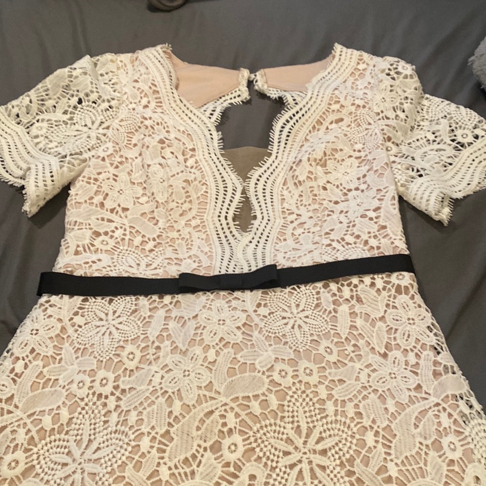 David’s bridal nude/cream colored wedding dress.